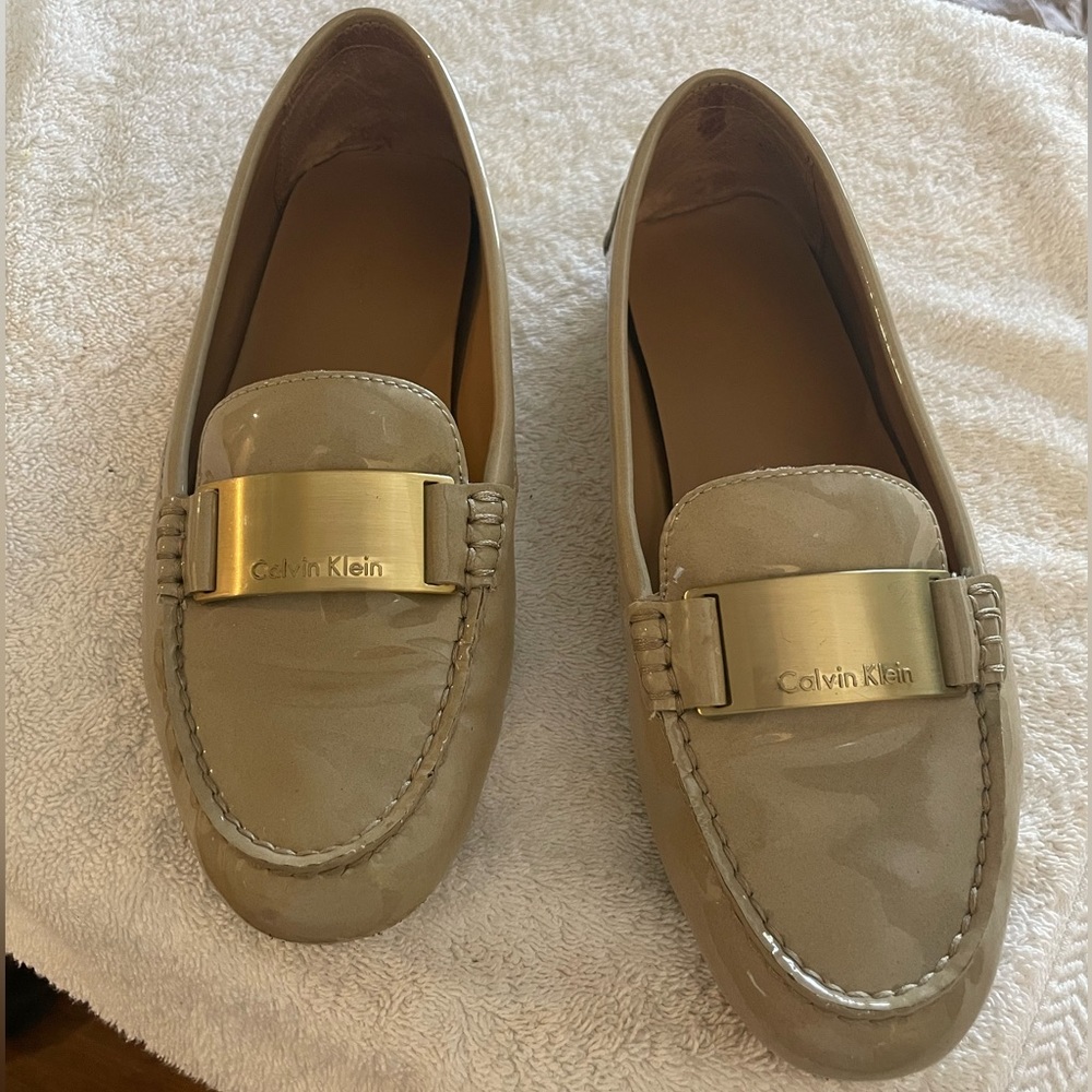 Calvin Klein Beige Patent Leather Loafers with Gold Accent